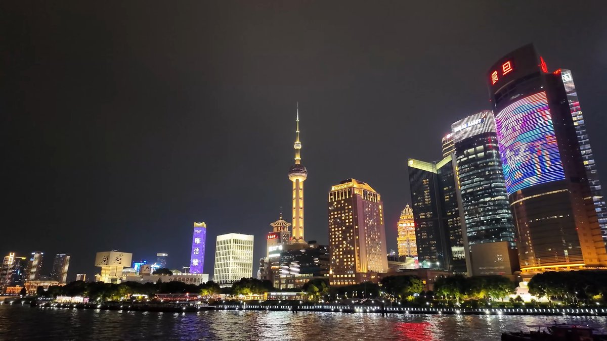 Oriental Pearl framed by skyscrapers