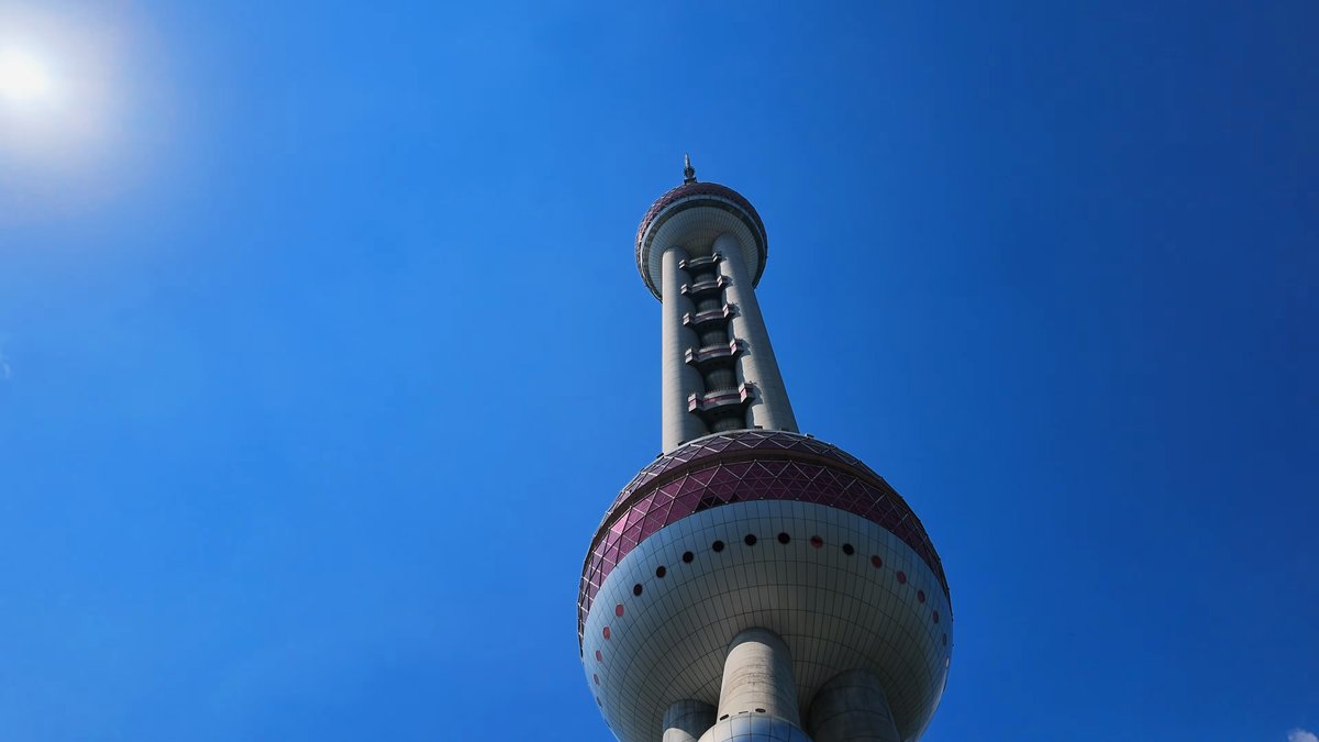 Oriental Pearl sphere against the sun