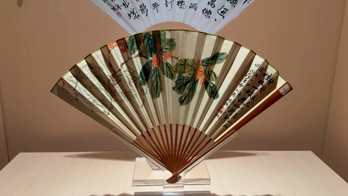 Painted fan with fruit branches
