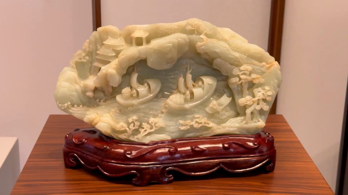 Pale green jade mountain carving