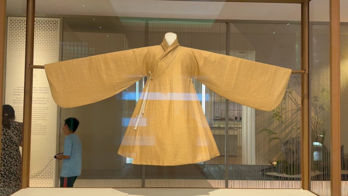 Pale yellow robe on display