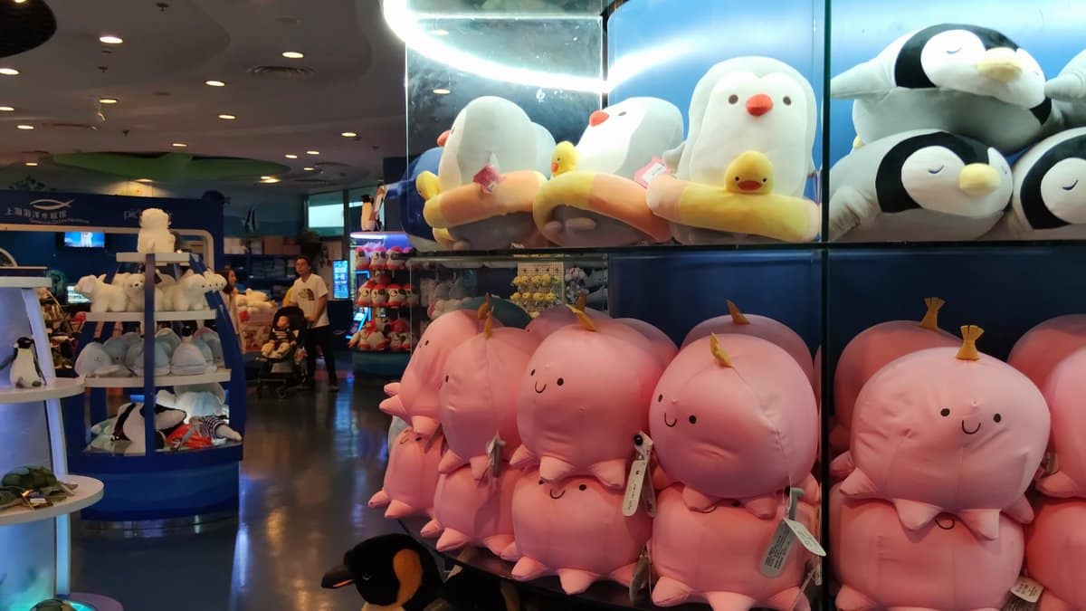 Plush pink octopuses and yellow ducks stacked on