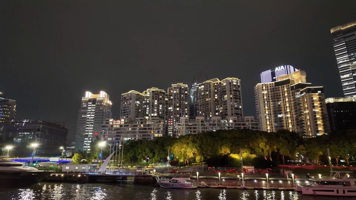 Riverside apartments and lit park