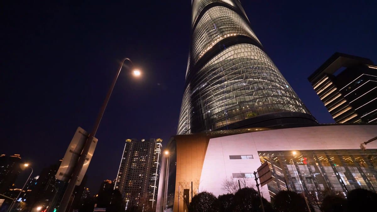 Shanghai Tower twisting up into the night sky