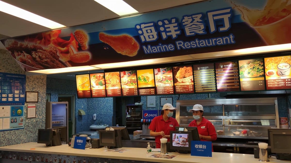 The 海洋餐厅 Marine Restaurant counter with backlit menu