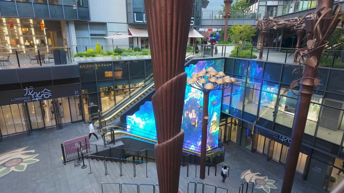 The modern shopping complex beside the temple, an