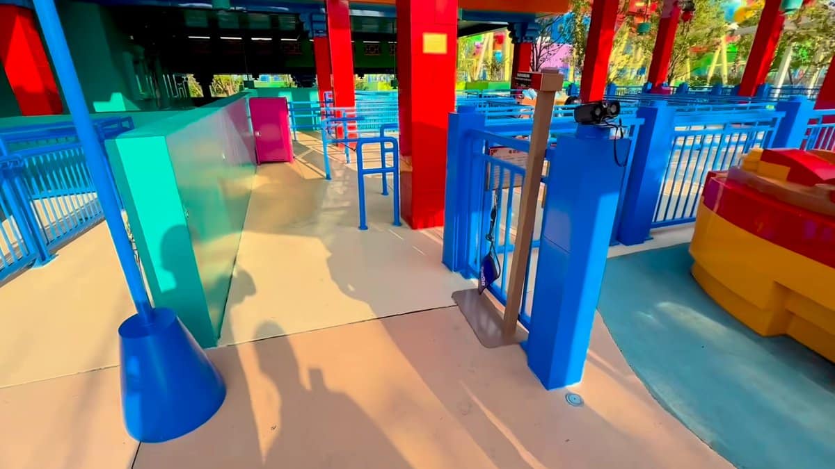 The queue line under a red and blue