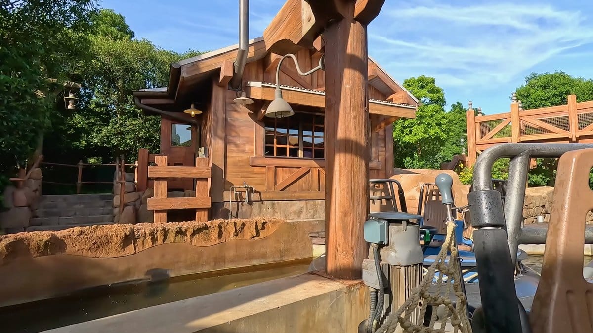 The rafting ride's timber structures and rocks.