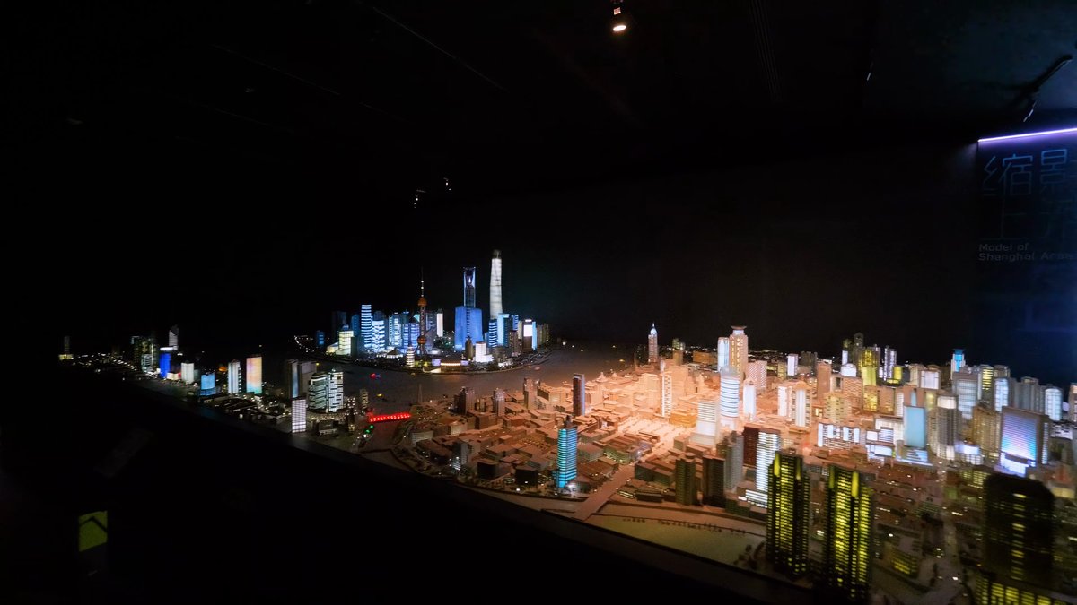 The scale model stretching across the room, the