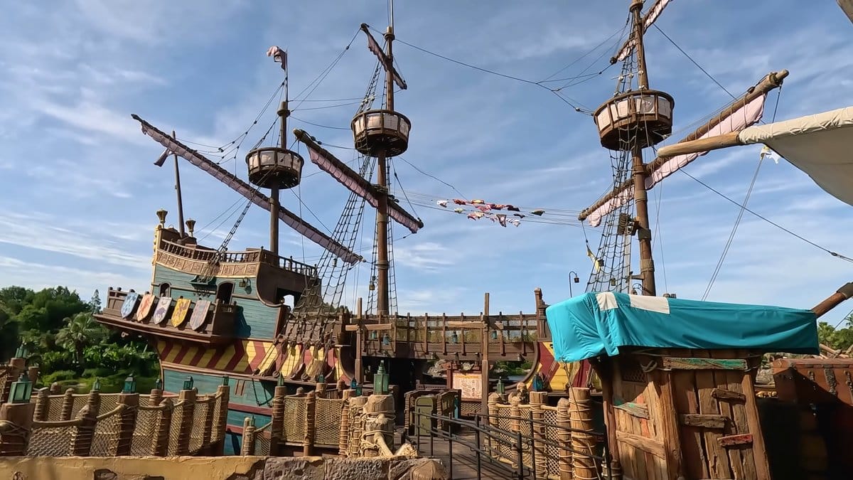 The ship's masts and rigging against the sky.