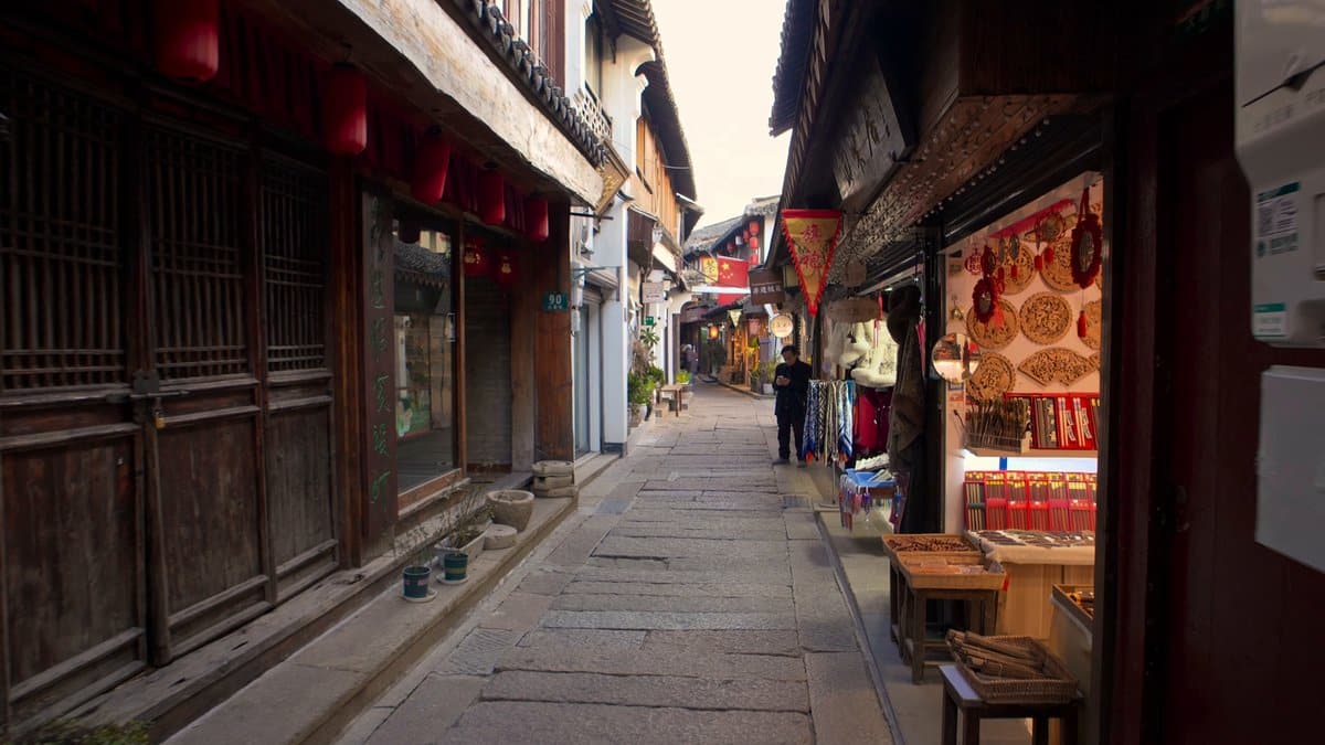 Timber houses hung with lanterns
