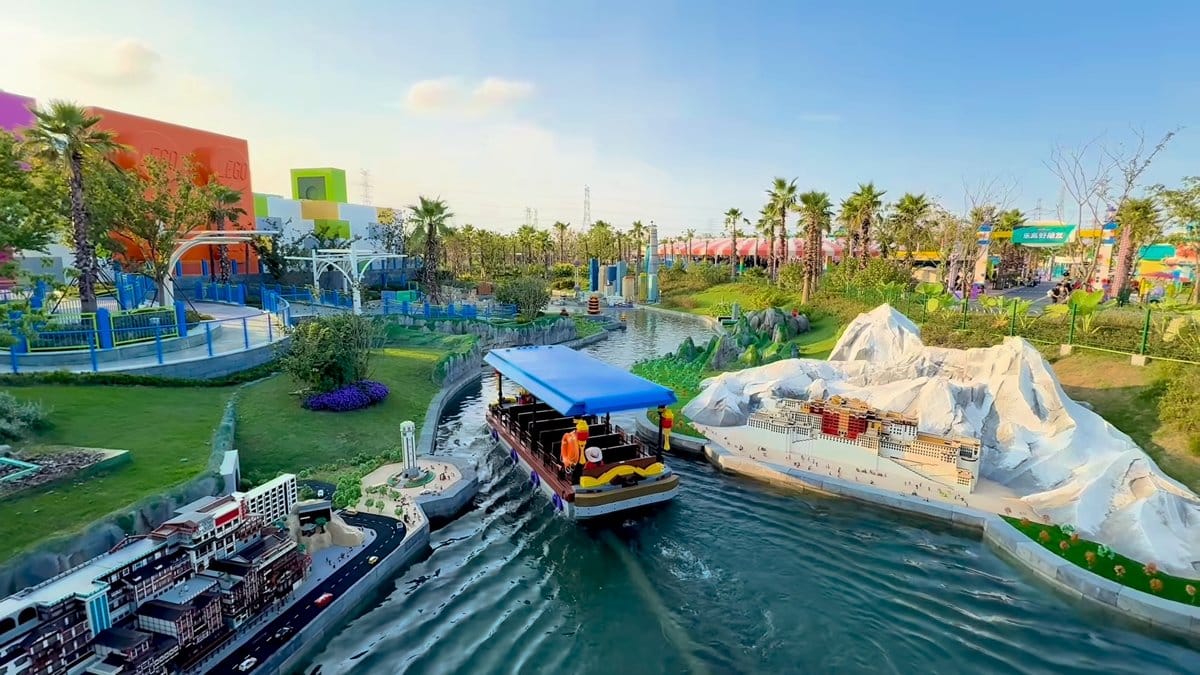 Tour boat passing mountain model