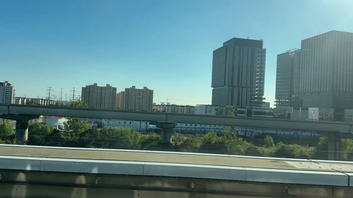 Towers blurred from Maglev window