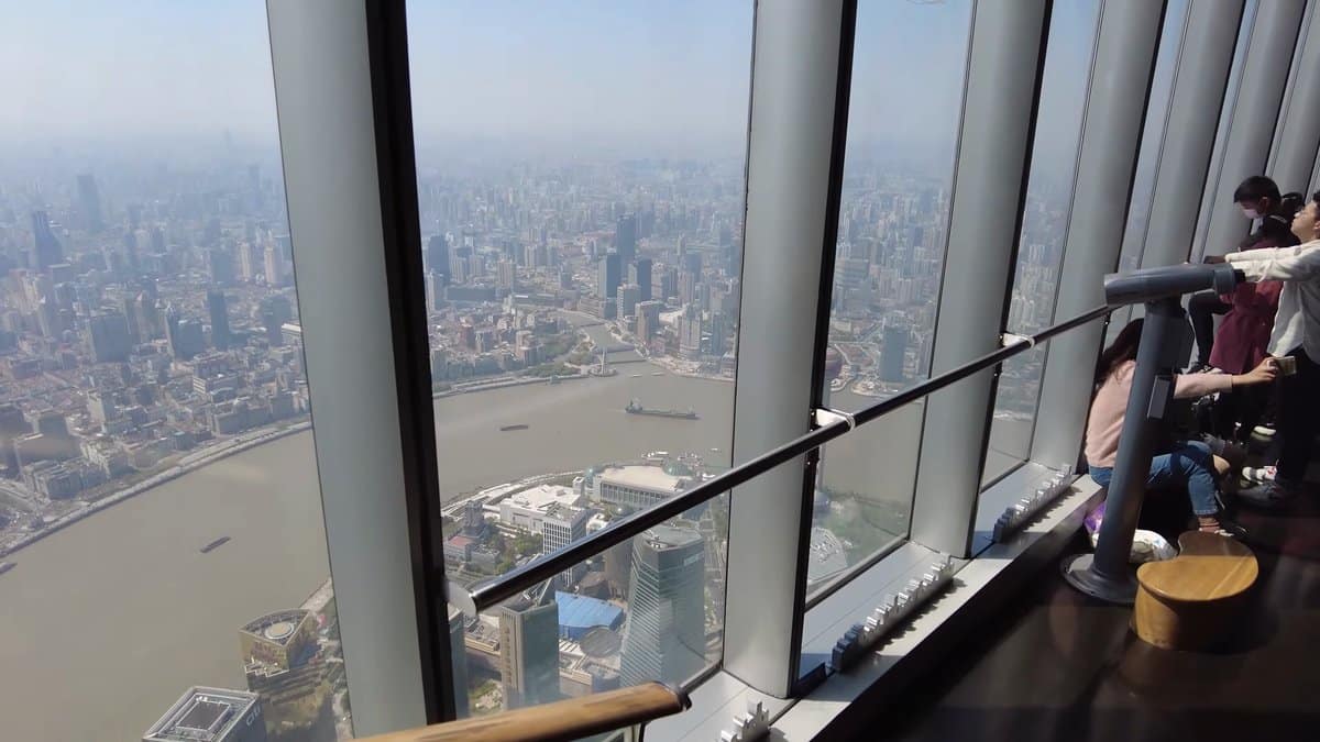 Visitors at observation deck windows