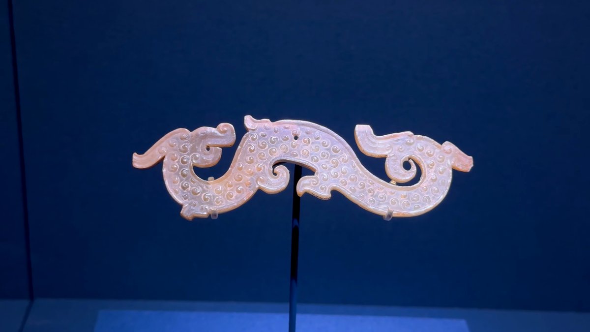 White jade curling dragon pendant