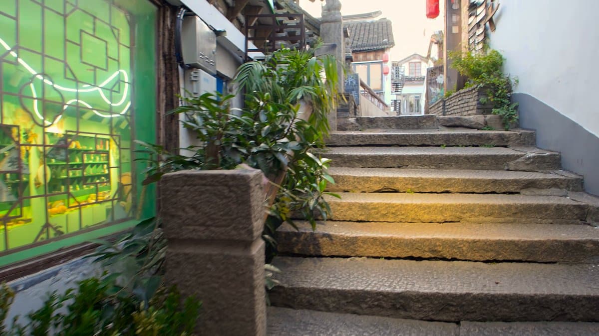Worn stone steps toward the bridge