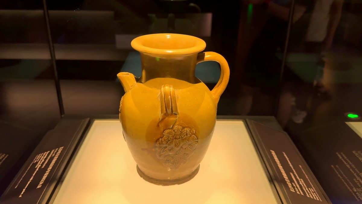Yellow-glazed ewer in case